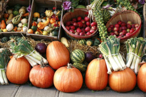 a collection of fresh  fall fruit and vegetables.